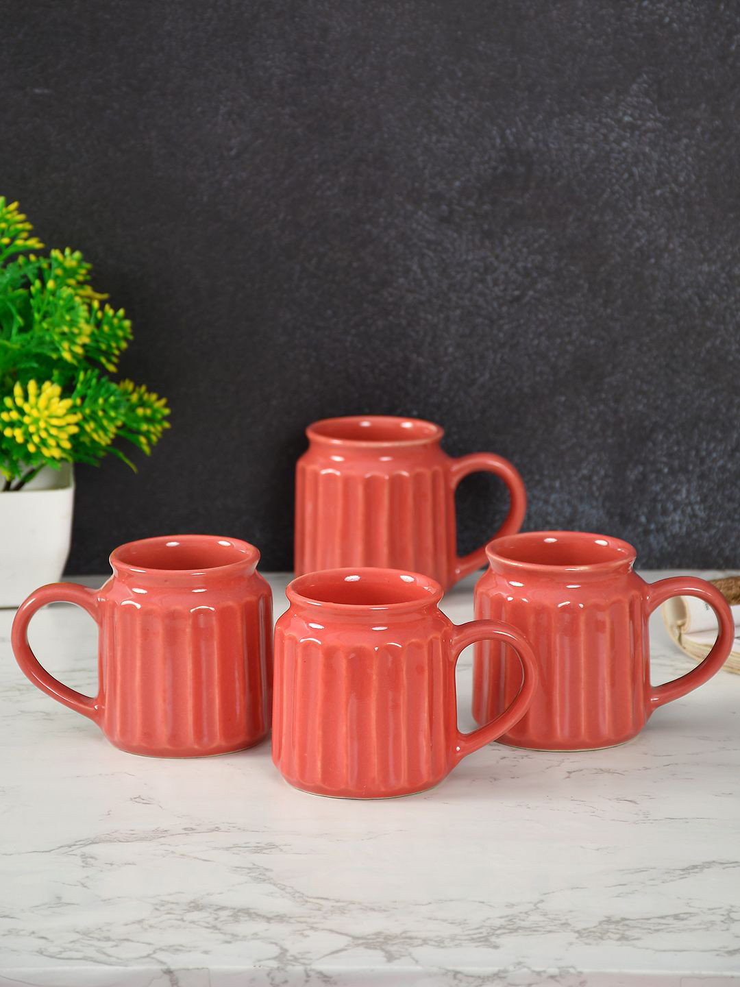 

CLIO'S HERITAGE STORE Peach-Coloured 4 Pieces Textured Ceramic Glossy Mugs
