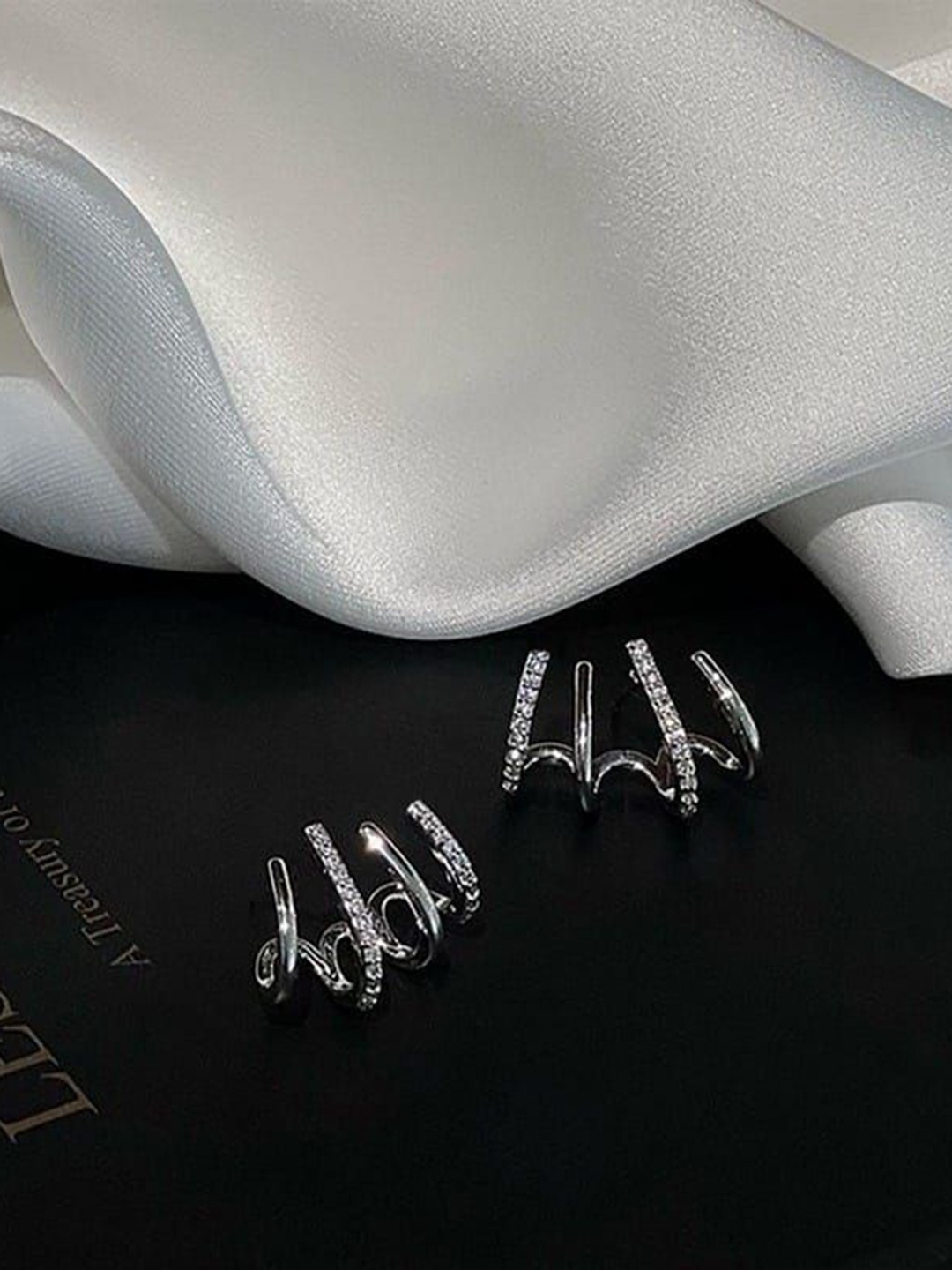 

YU FASHIONS Silver-Plated Rhinestone Studded Geometric Studs Earrings