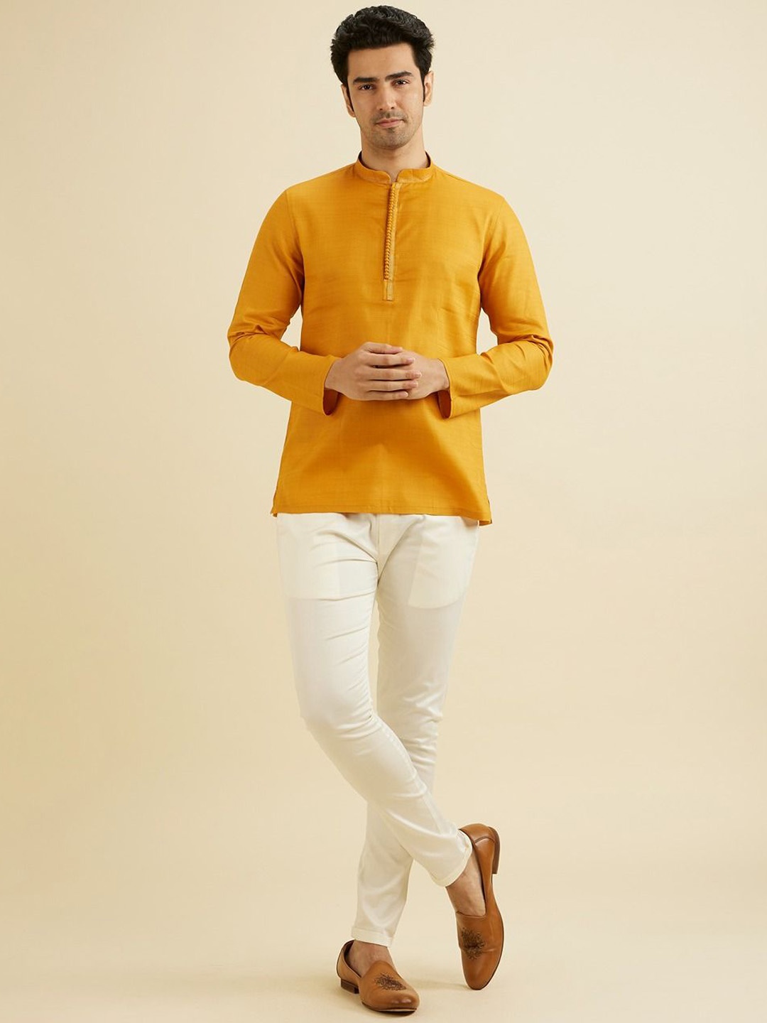 

Manyavar Mandarin Collar Thread Work Cotton Straight Short Kurta, Mustard