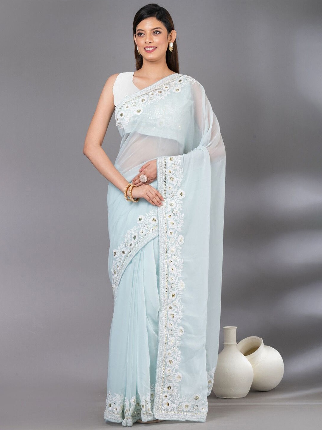 

Celeb Styles Floral Embroidered Saree, Turquoise blue