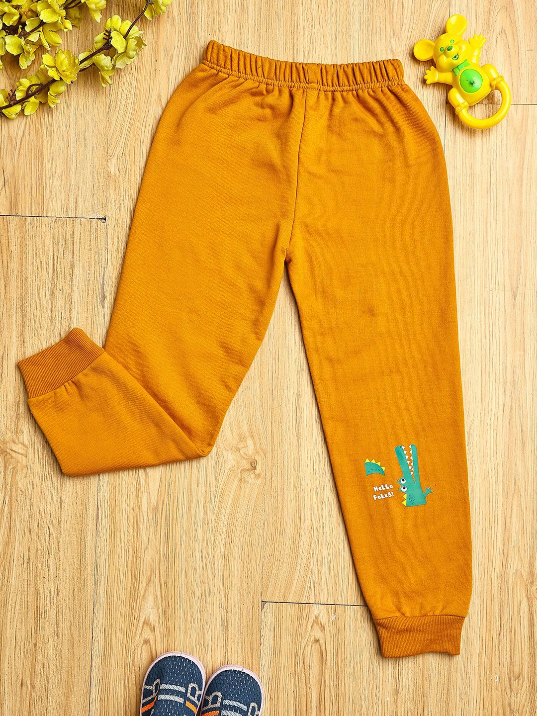 

Cutiekins Boys Graphic Printed Mid Rise Casual Joggers, Mustard