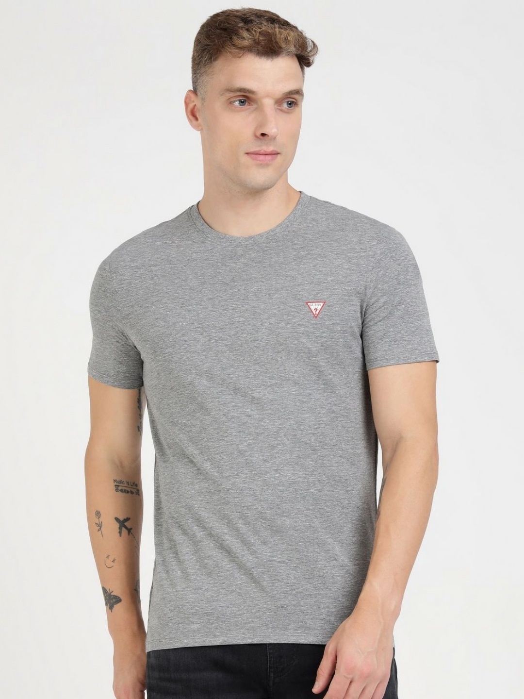 

GUESS Men Solid Round Neck Cotton T-shirt, Grey