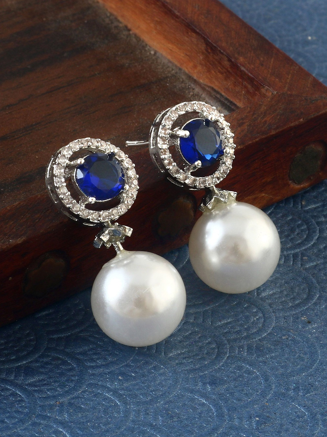 

Jewar Mandi Silver-Plated Cubic Zirconia Studded & Pearls Beaded Circular Drop Earrings