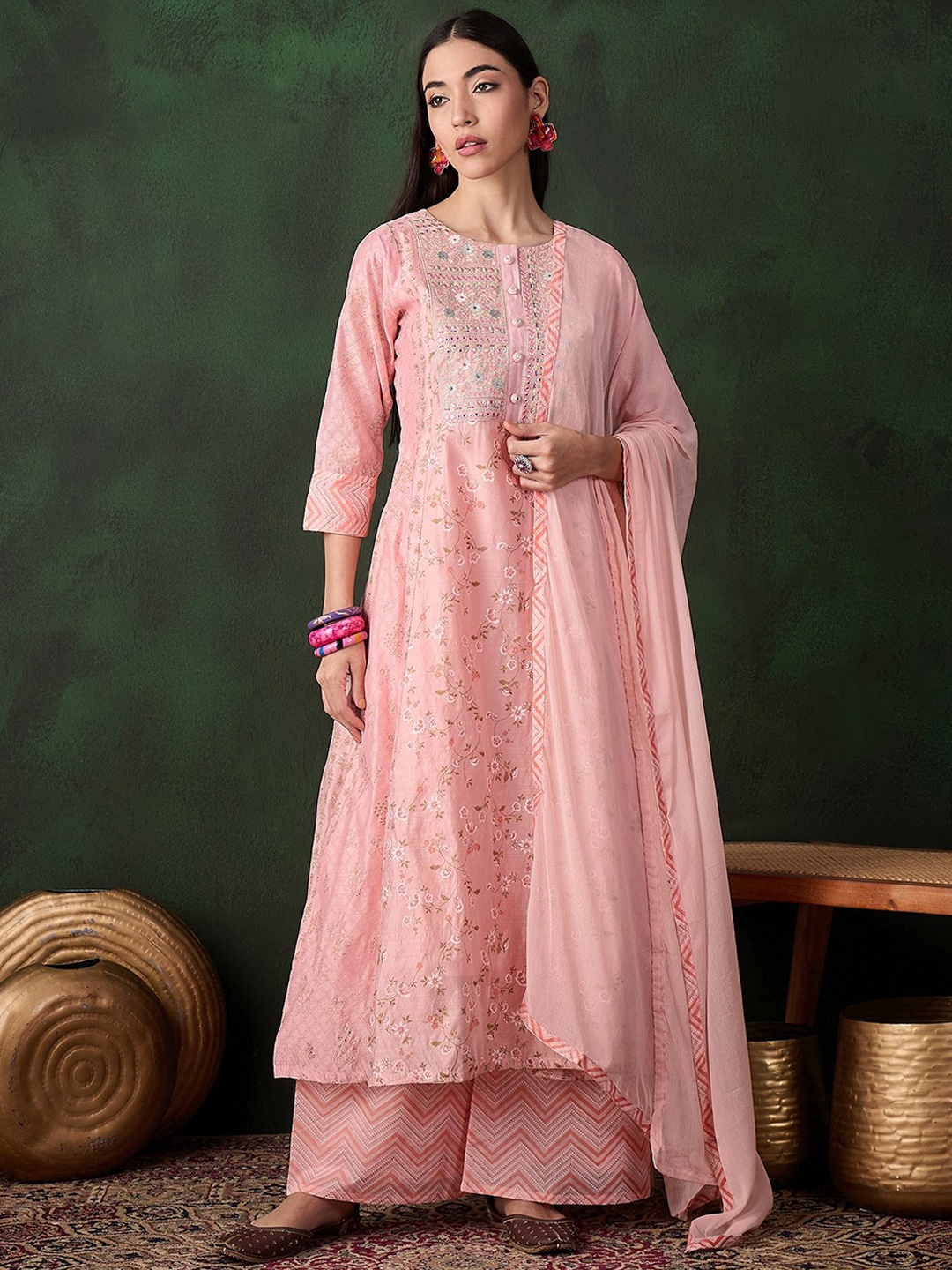 

Sangria Peach Floral Printed Round Neck Thread Work Silk Chiffon Kurta & Palazzo & Dupatta