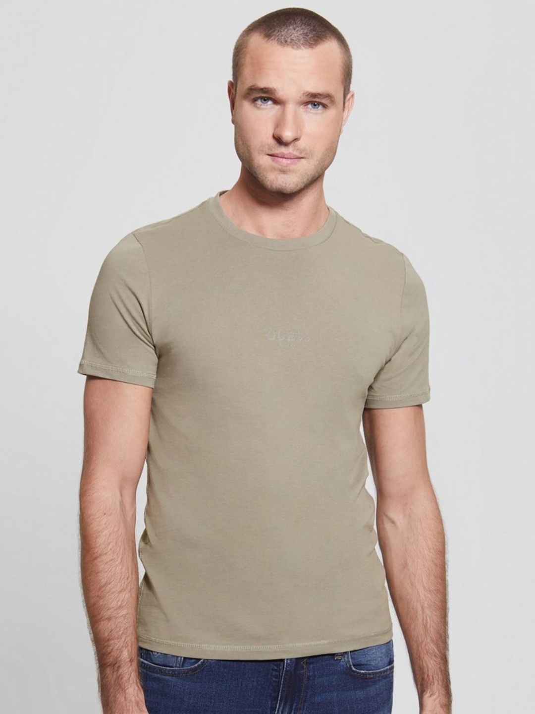 

GUESS Men Solid Round Neck Pure Cotton T-shirt, Green