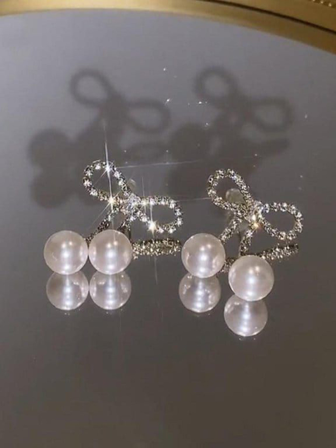 

YU FASHIONS Silver-Plated Rhinestone Studded Geometric Drop Earrings