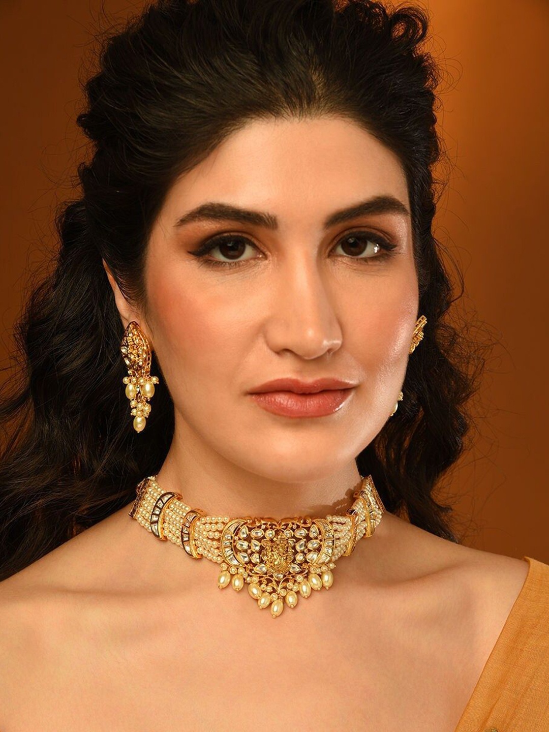 

JAYPORE Gold-Plated Stone Studded Necklace and Earrings