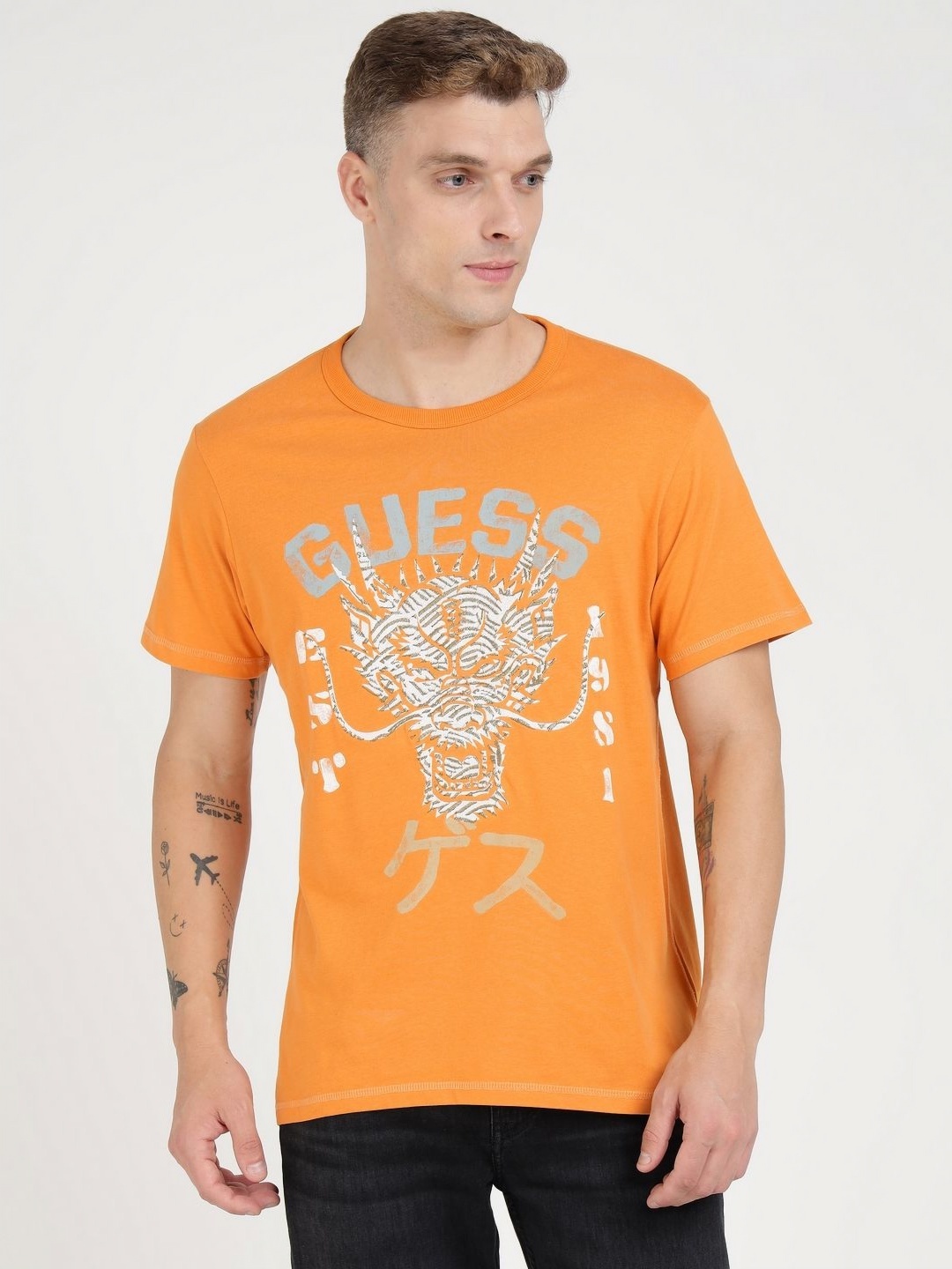 

GUESS Men Typography Printed Round Neck Pure Cotton T-shirt, Mustard