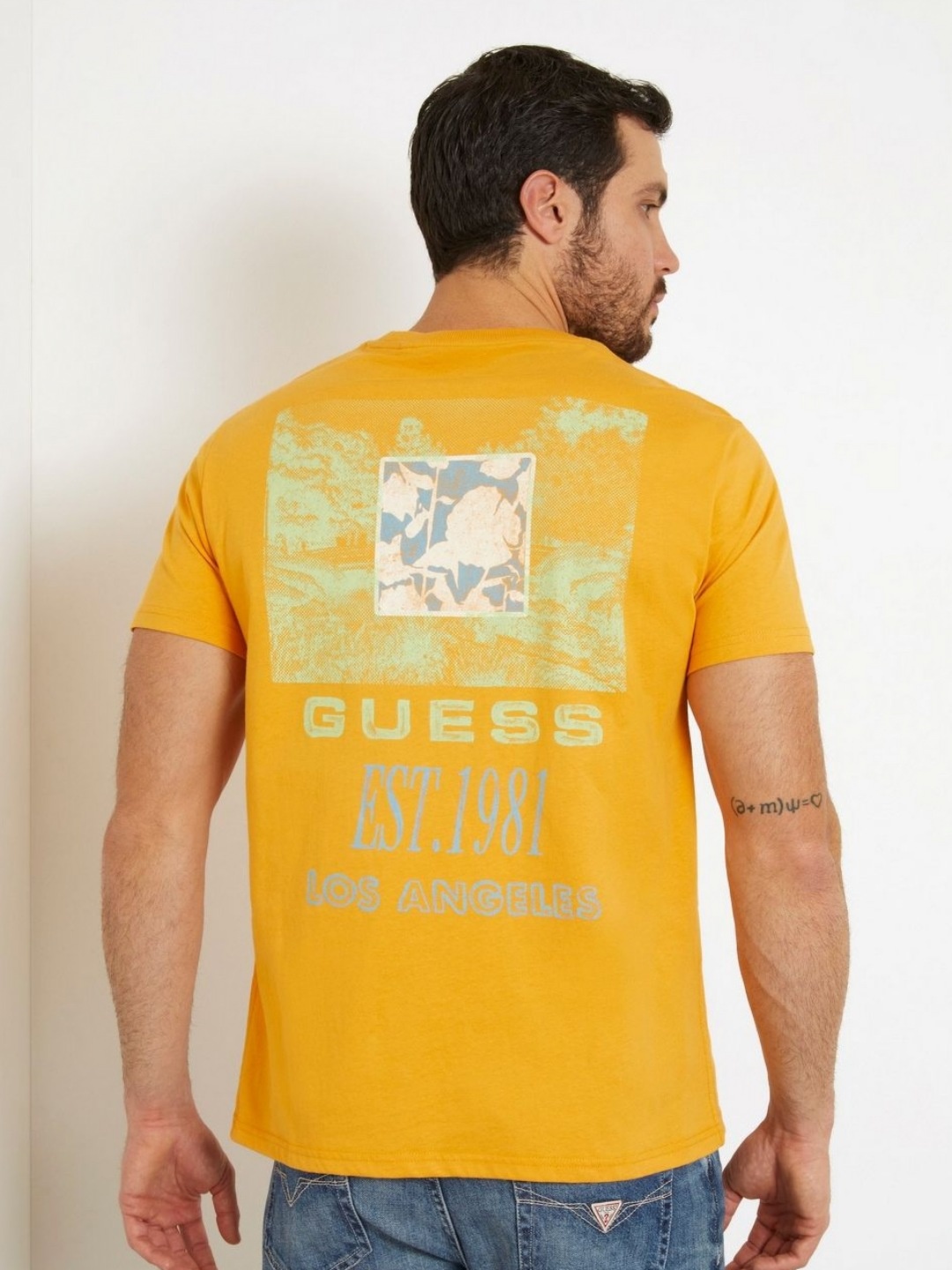 

GUESS Men Typography Printed Round Neck Pure Cotton T-shirt, Mustard