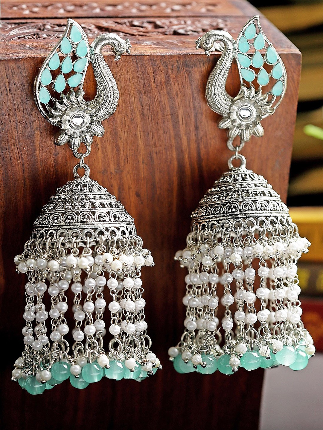

KARATCART Peacock Shaped Oxidised Jhumka Earrings, Silver