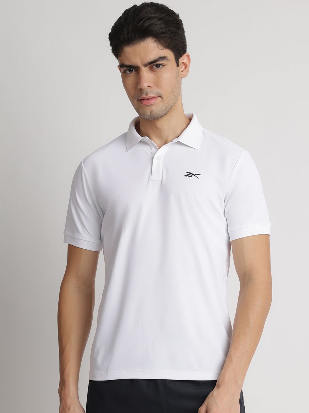 

Reebok Men Solid Polo Collar T-shirt, White