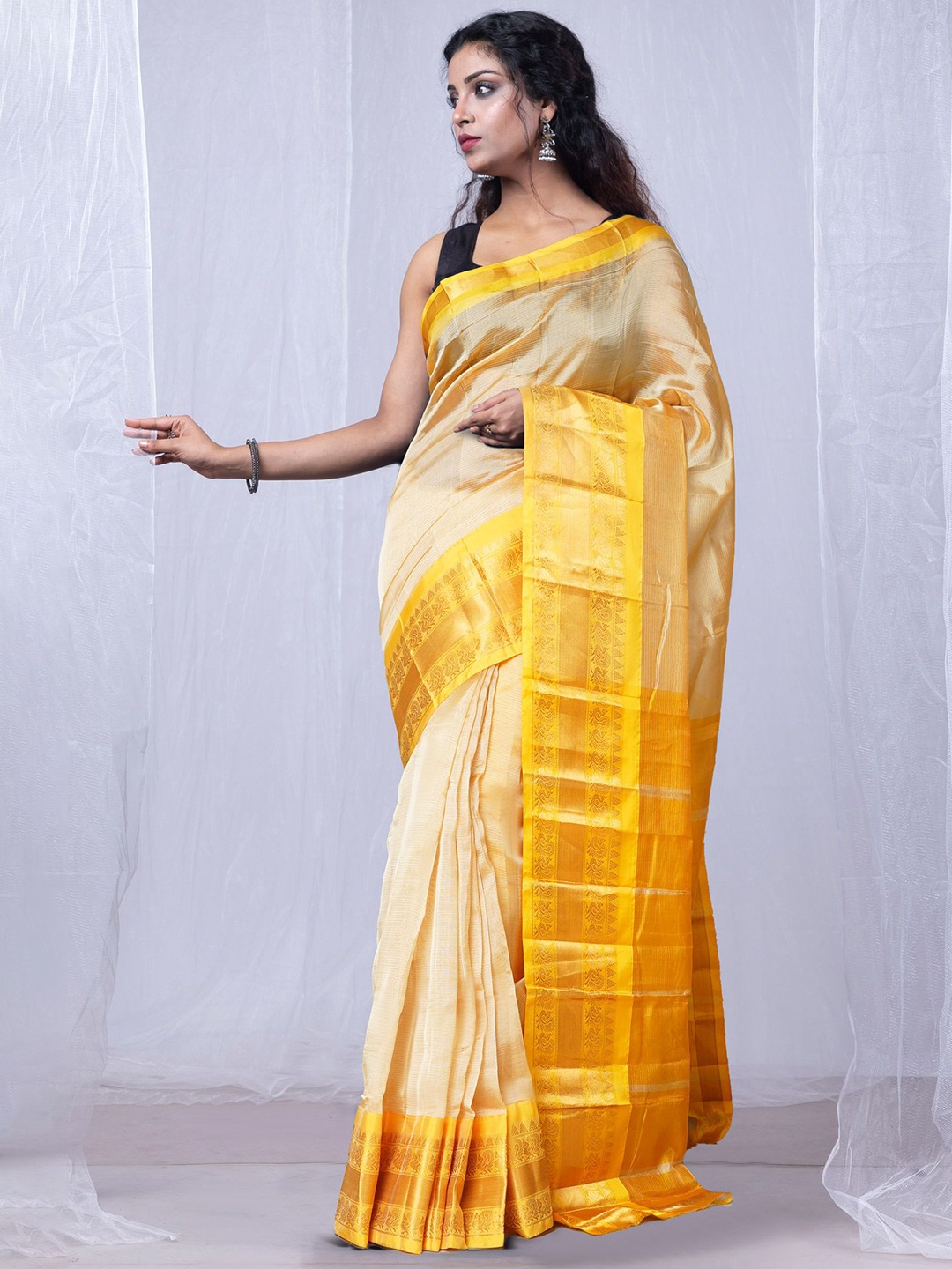 

Unnati Silks Ethnic Motifs Zari Handloom Gadwal Saree, Cream