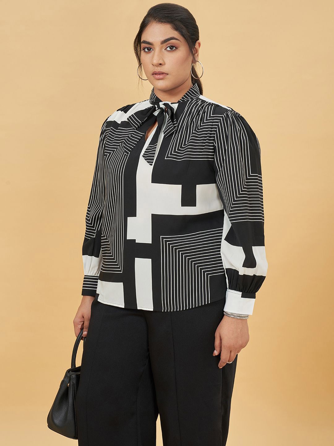 

Honey Curvytude by Pantaloons Women Geometric Printed Tie-Up Neck Top, Black