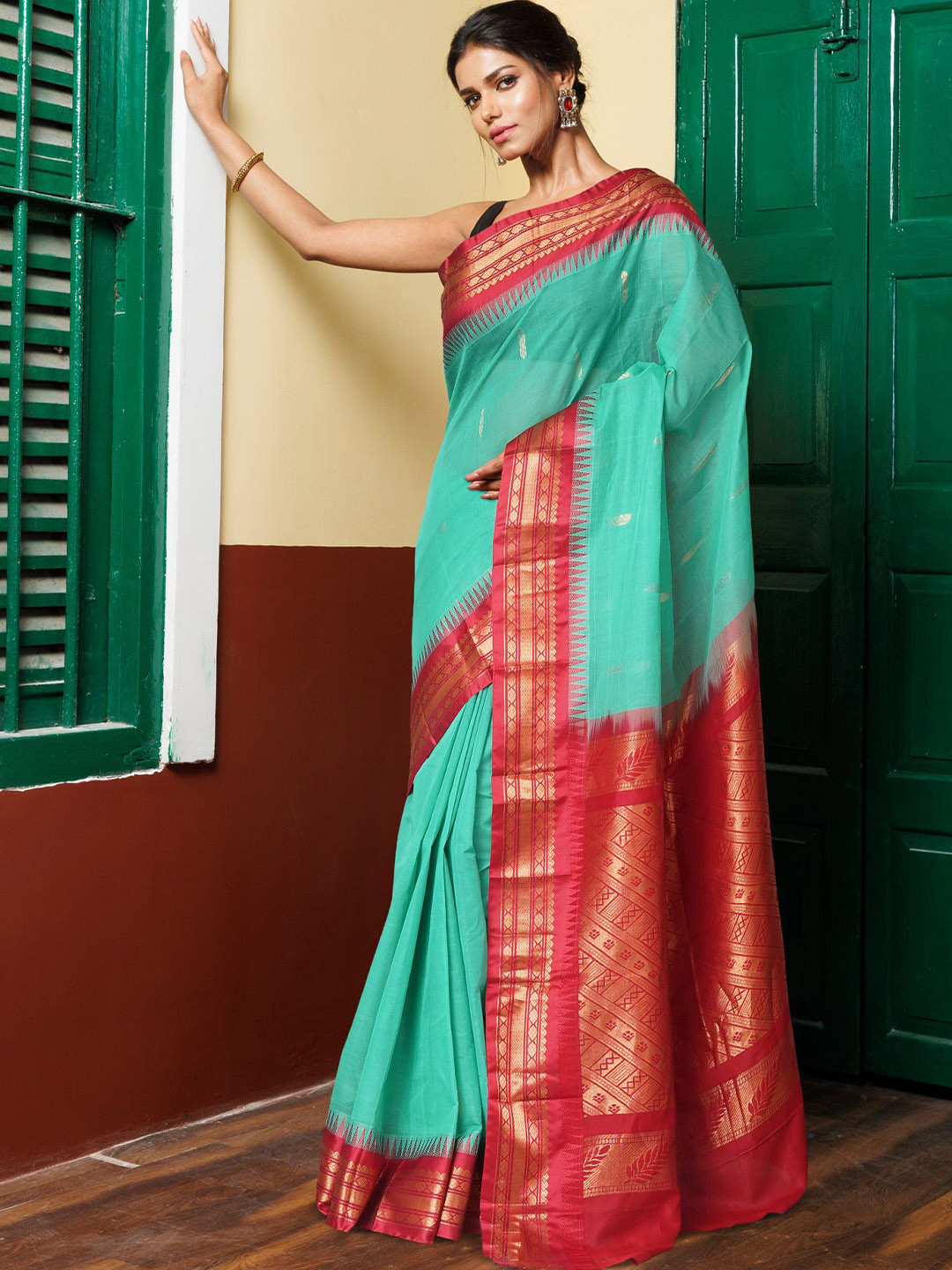 

Unnati Silks Woven Design Zari Pure Cotton Gadwal Saree, Green