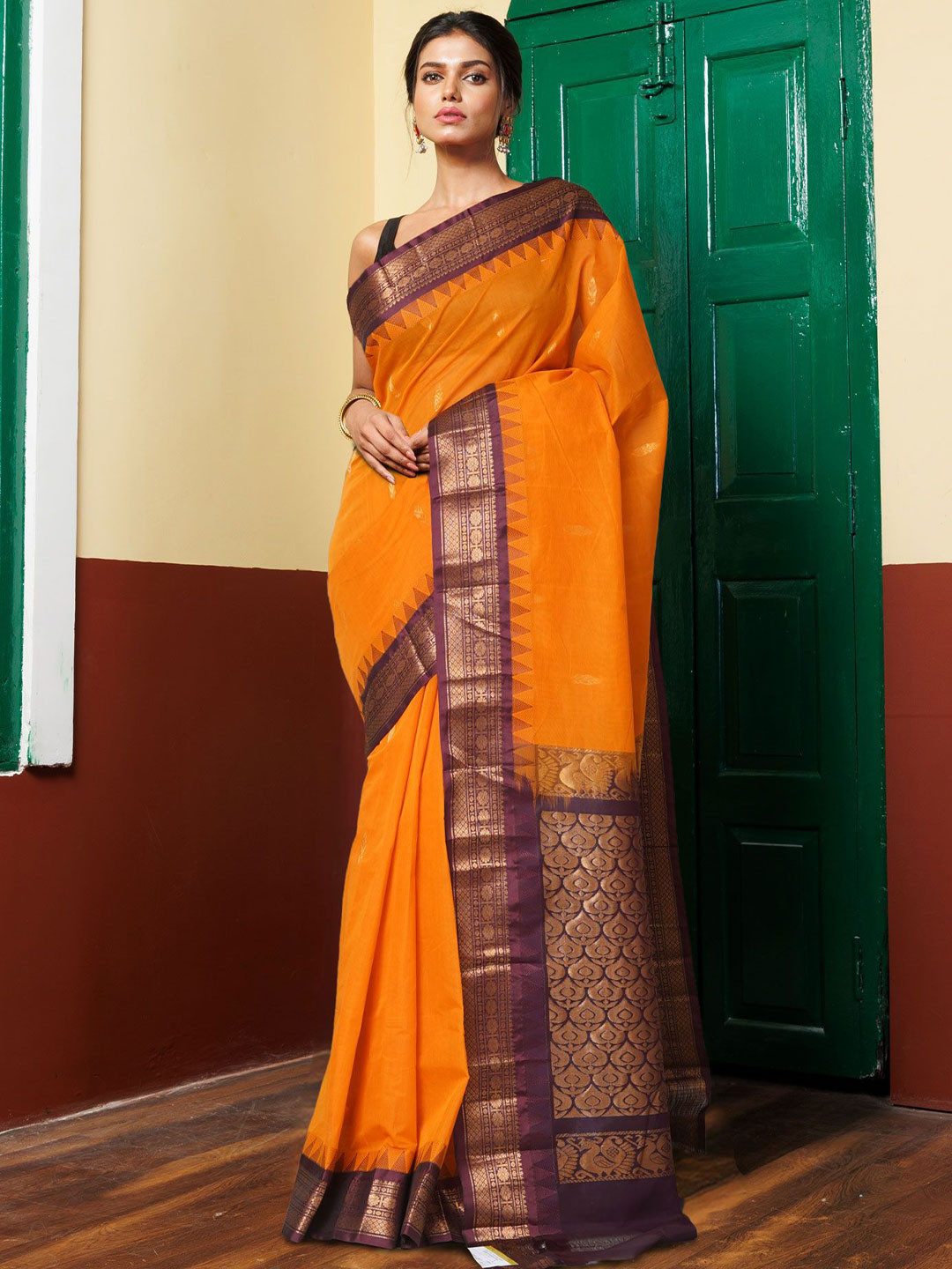 

Unnati Silks Woven Design Zari Pure Cotton Handloom Gadwal Saree, Yellow