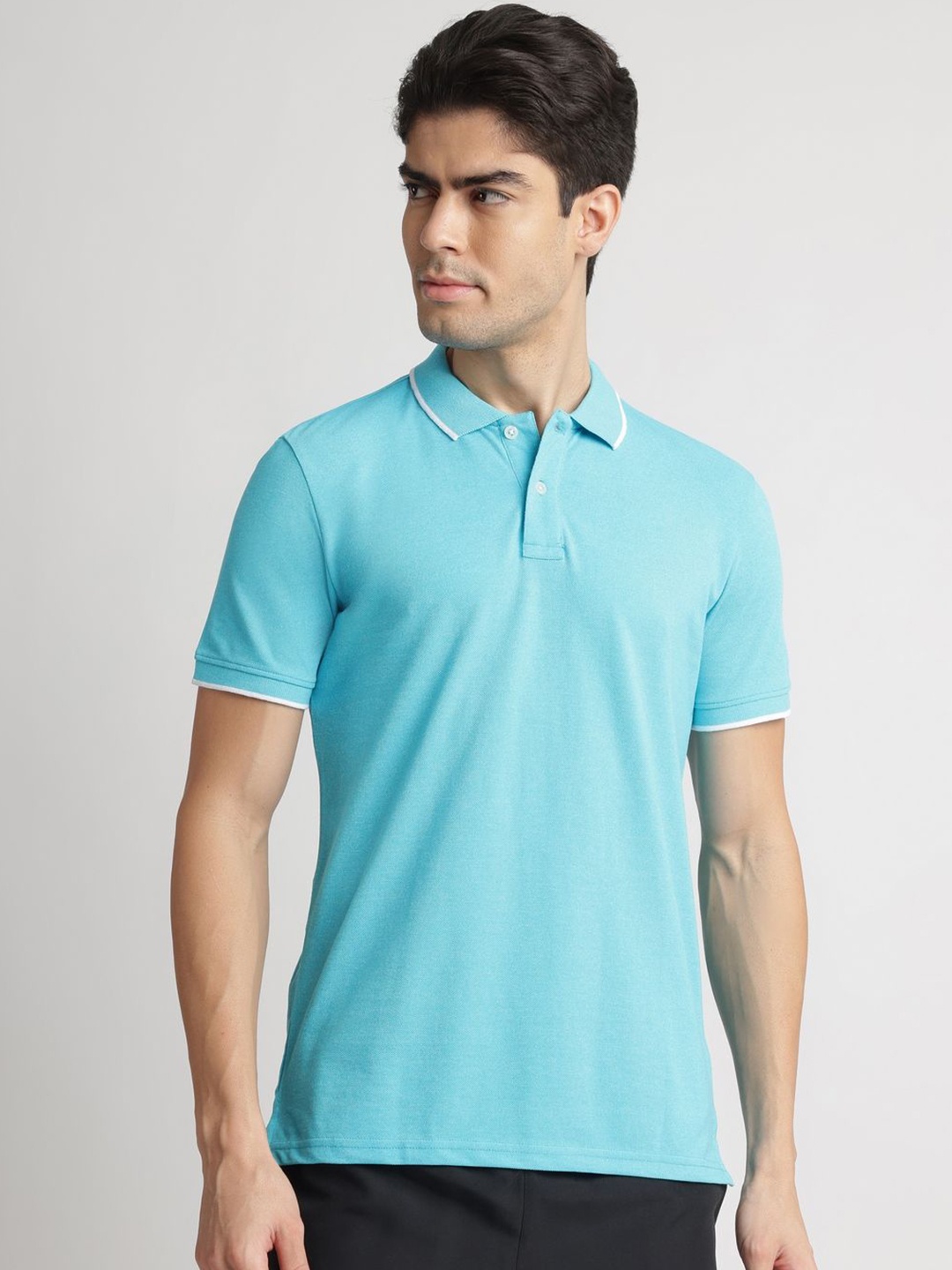 

Reebok Men Solid Polo Collar Cotton T-shirt, Blue