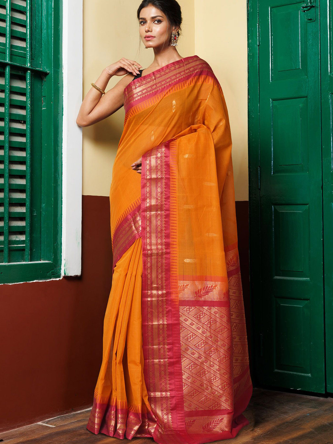

Unnati Silks Woven Design Zari Pure Cotton Handloom Gadwal Saree, Yellow