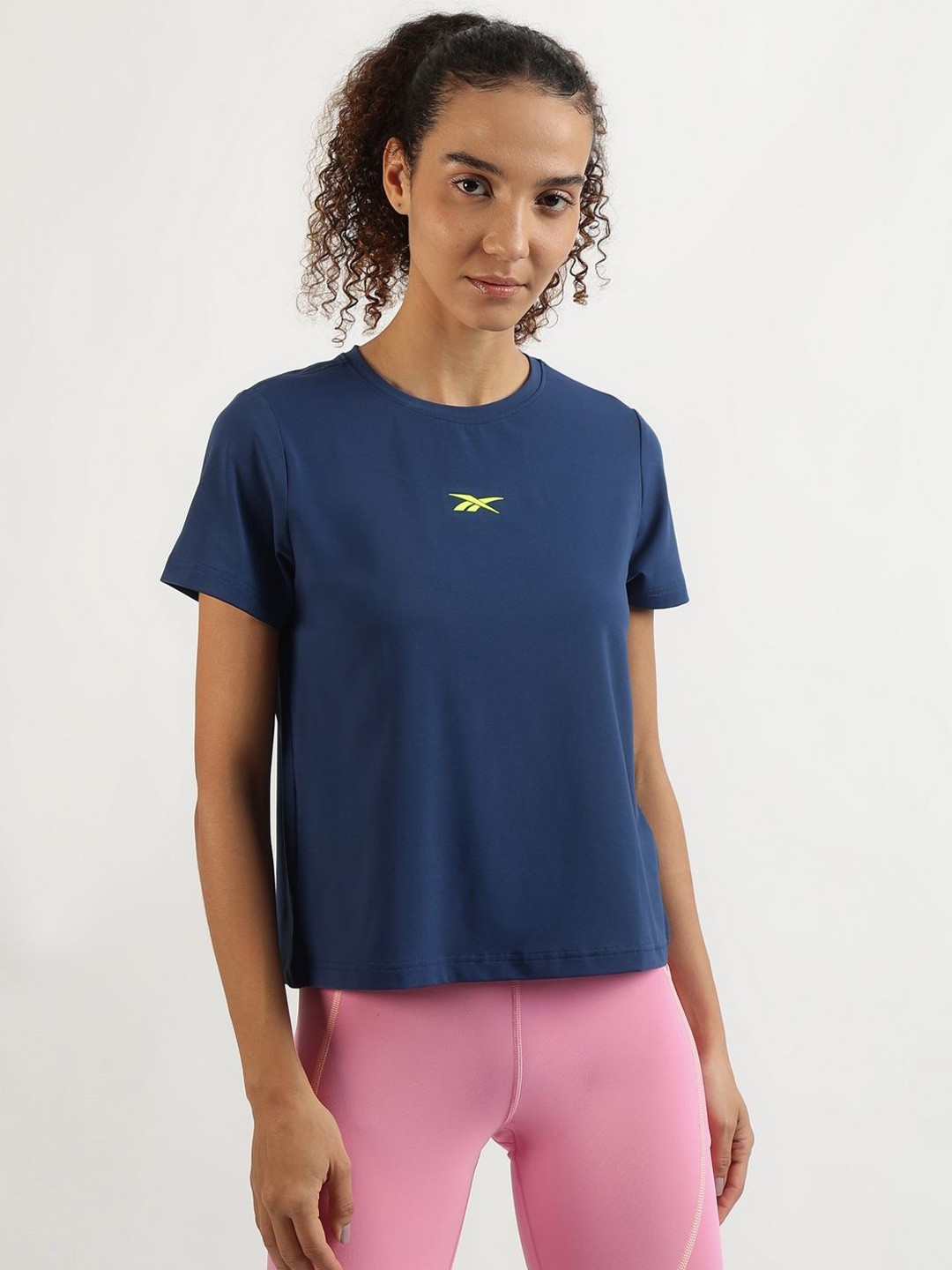 

Reebok Women Solid Round Neck T-shirt, Navy blue