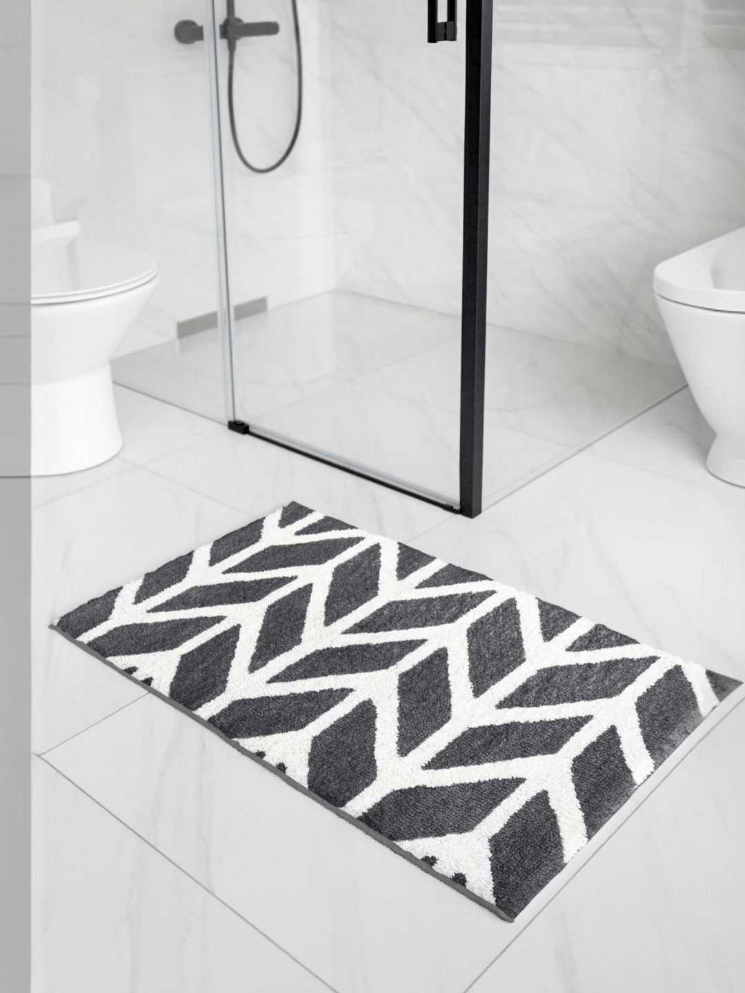 

Encasa Homes Grey & White Printed 210 GSM Microfibre Rectangular Bath Rug