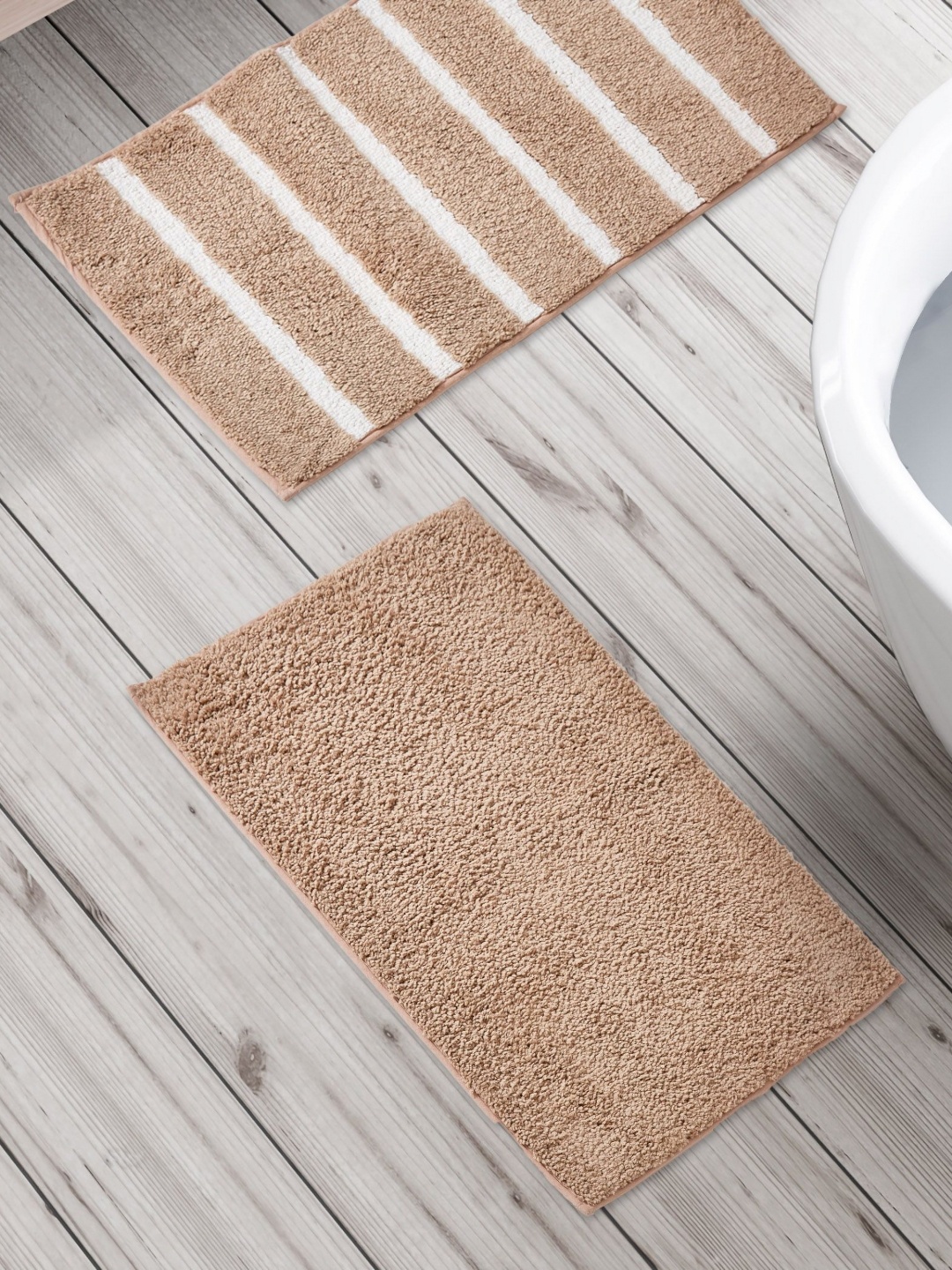 

Home Centre Fiesta Preston Beige & White 2 Pieces Striped 150 GSM Anti Slip Bath Rugs