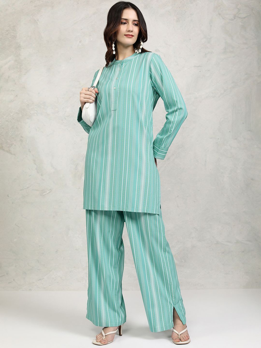 

Vishudh Turquoise Blue Striped Band Collar Long Sleeves Top With Palazzo