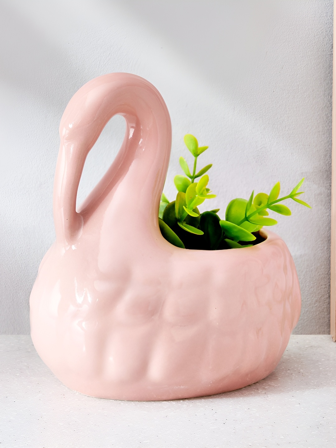 

Home Centre Peach Coloured Ceramic Swan Planter