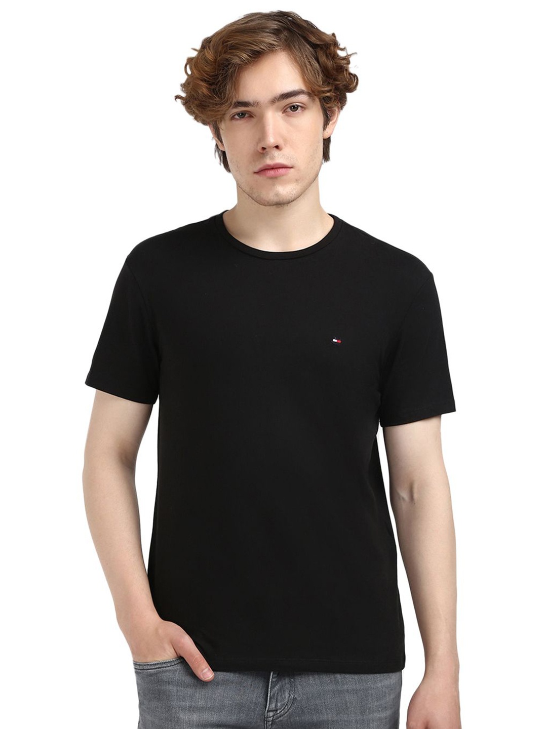 

Tommy Hilfiger Men Solid Round Neck Cotton T-shirt, Black