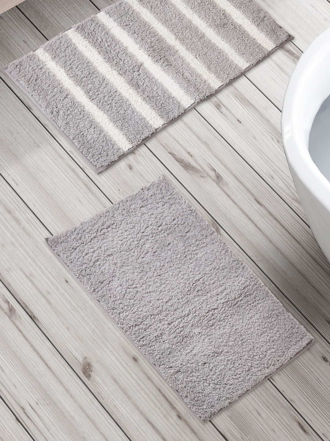 

Home Centre Fiesta Preston Grey & White 2 Pieces Striped 150 GSM Anti Slip Bath Rugs