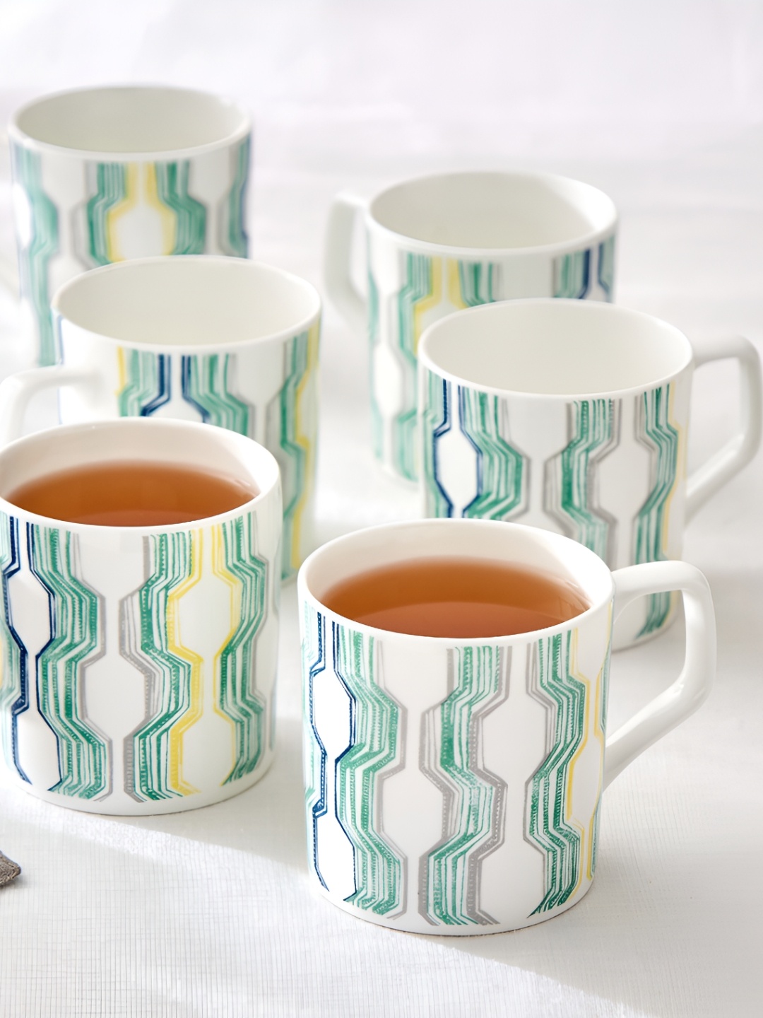 

Home Centre Corsica Mandarin Green 6 Pcs Geometric Printed Bone China Glossy Mugs 230 ml