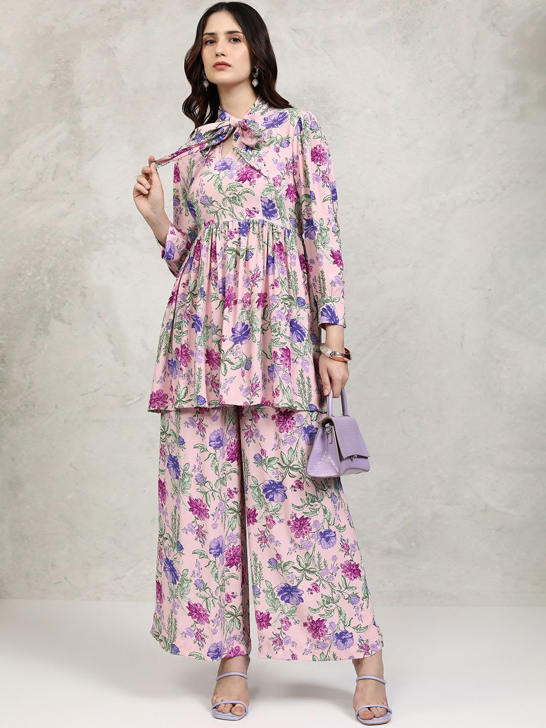 

Vishudh Pink Floral Printed Tie-Up Neck Three-Quarter Sleeves Tunic With Trouser