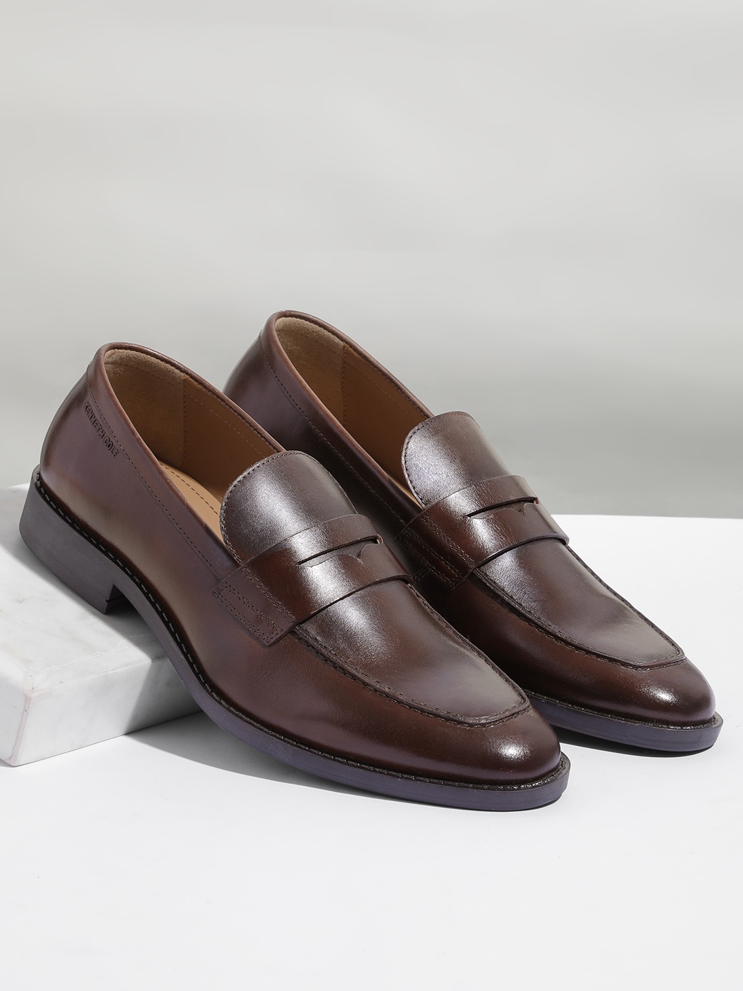 

Kenneth Cole Men Leather Formal Penny Loafers, Brown