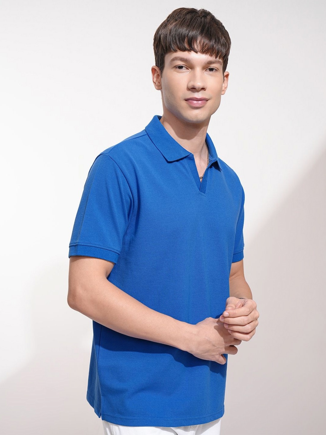 

HIGHLANDER Men Solid Polo Collar Relaxed Fit T-shirt, Blue