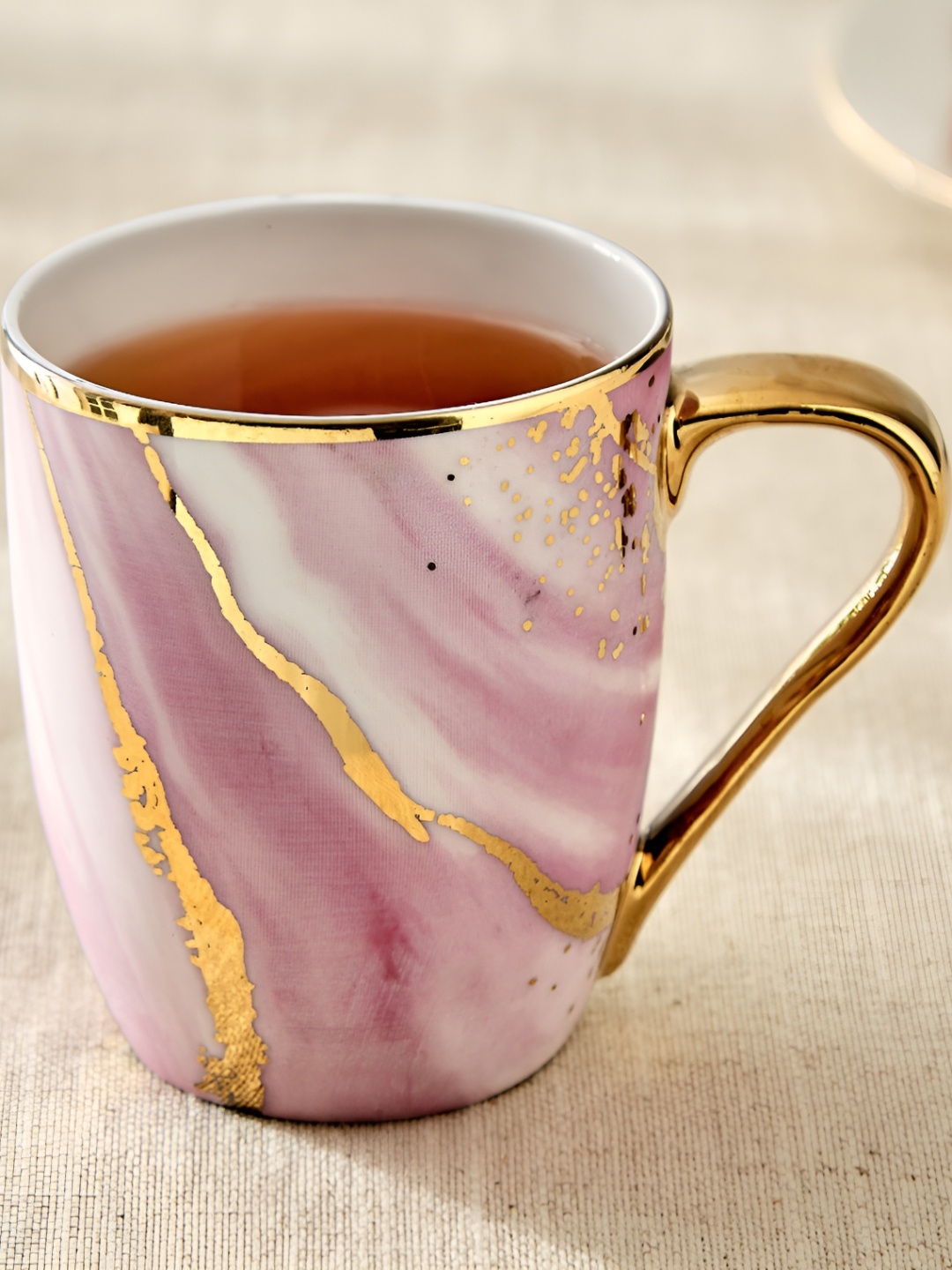 

Home Centre Purple & Gold-Toned Geometric Printed Bone China Glossy Mugs Set of Cups and Mugs