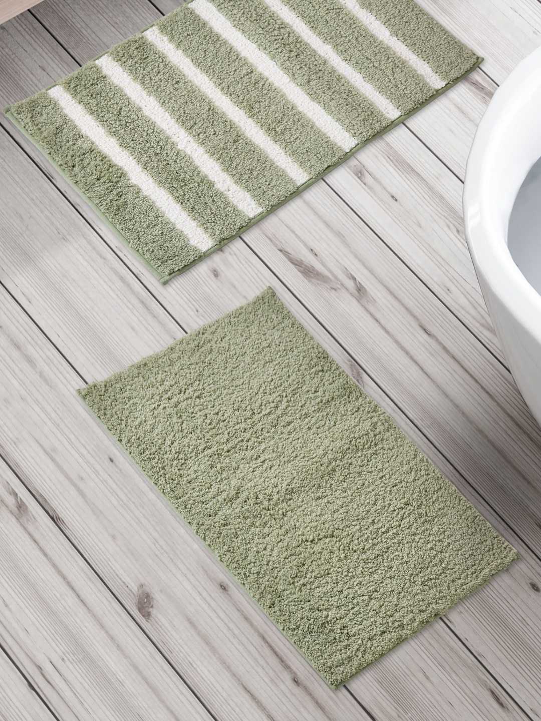 

Home Centre Fiesta Preston Green & White 2 Pieces Striped 150 GSM Anti Slip Bath Rugs