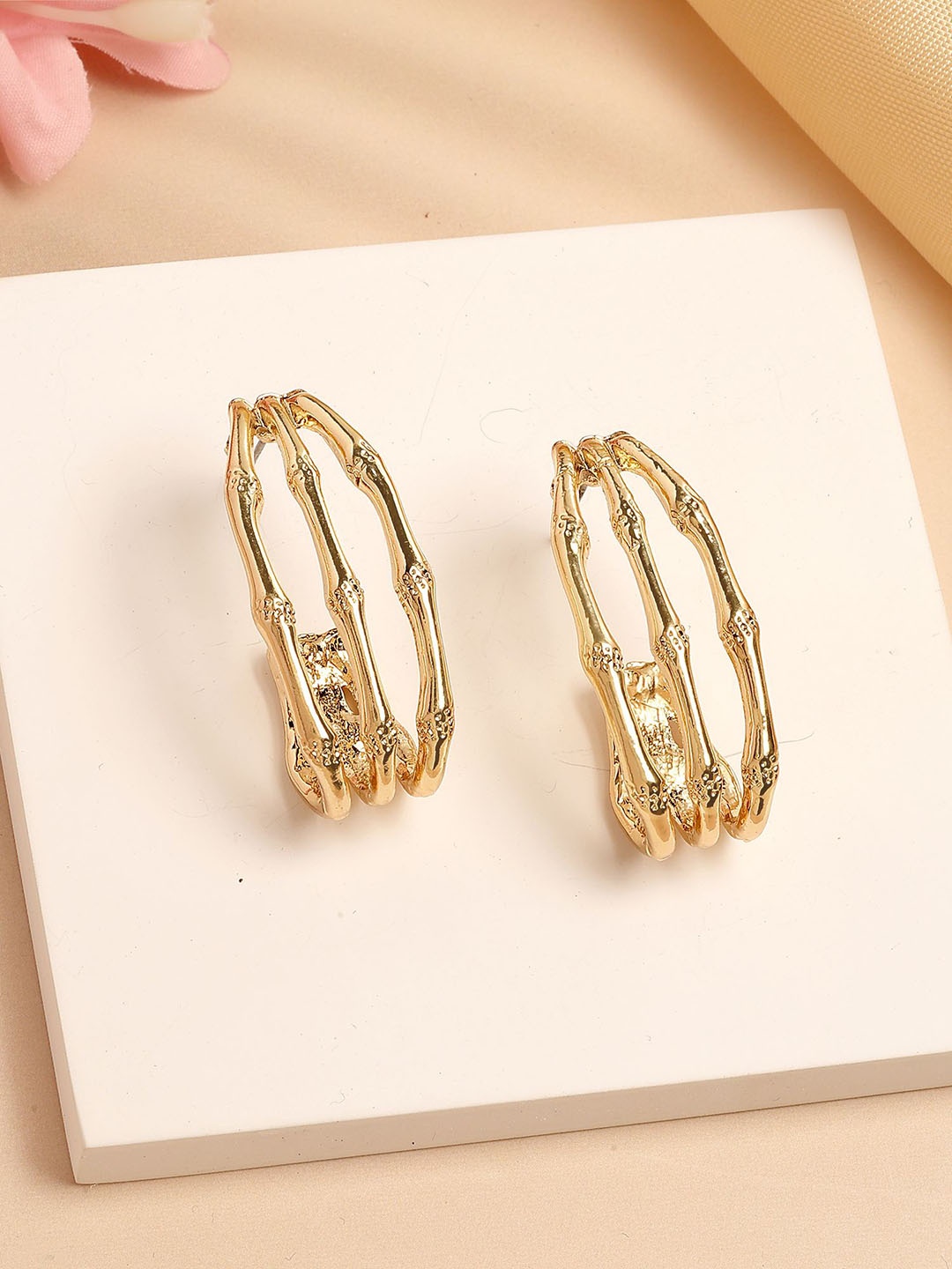 

Bohey by KARATCART Gold-Plated Contemporary Half Hoop Earrings