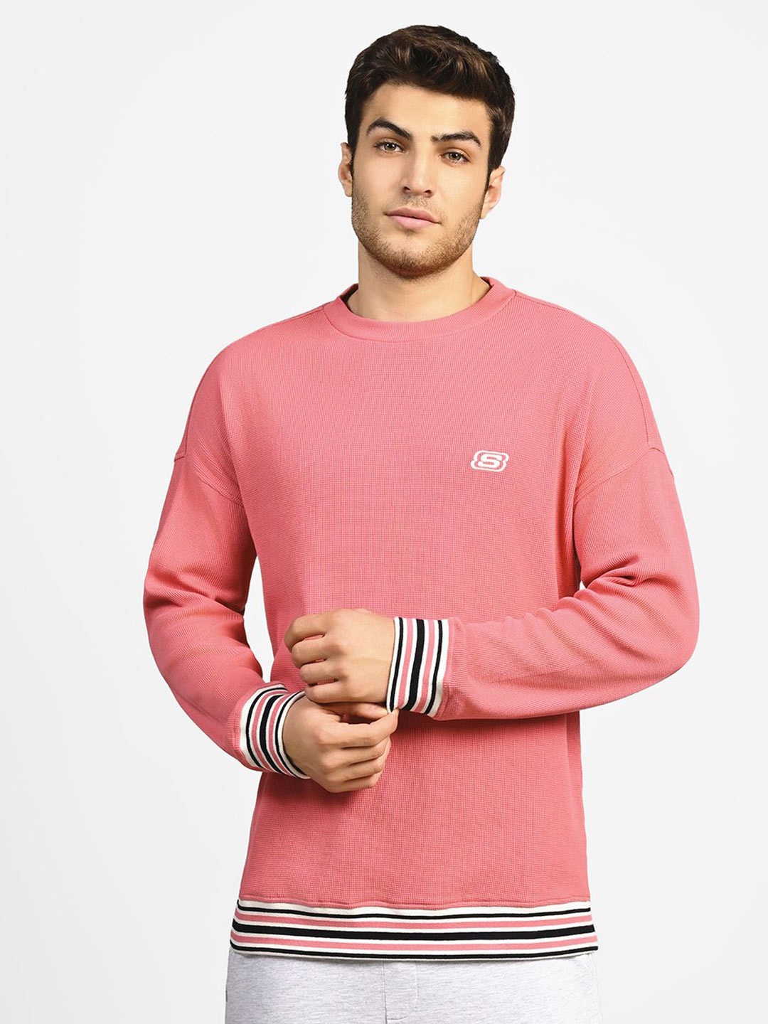 

Skechers Men Solid Round Neck Cotton T-shirt, Pink