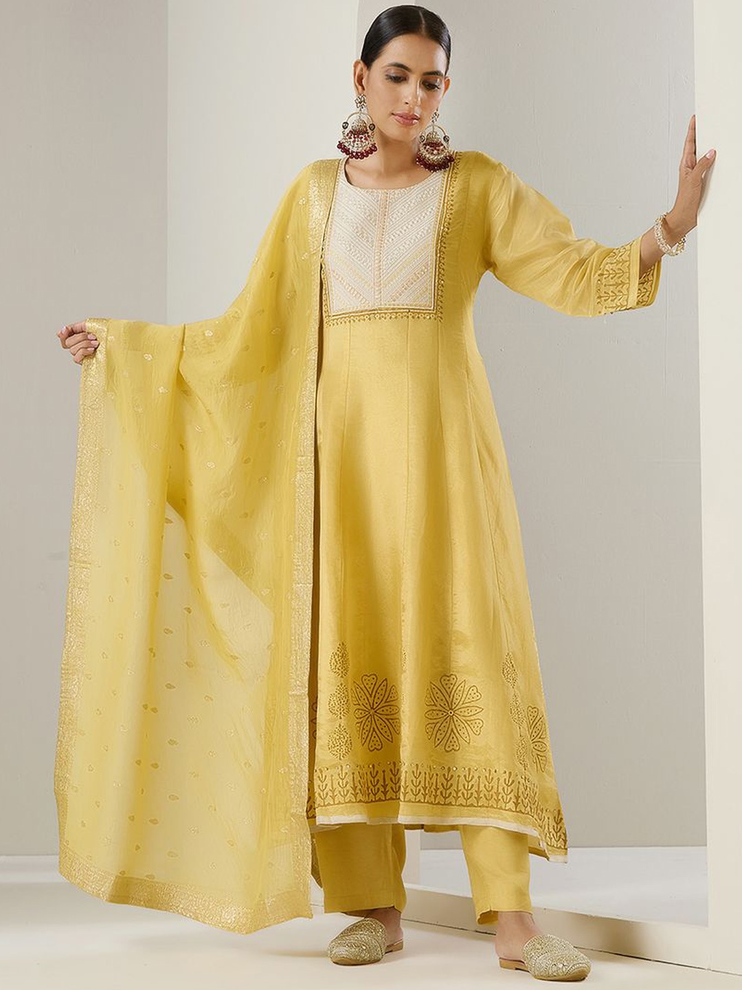 

Ishin Yellow Ethnic Motifs Embroidered Anarkali Kurta With Trousers & Dupatta