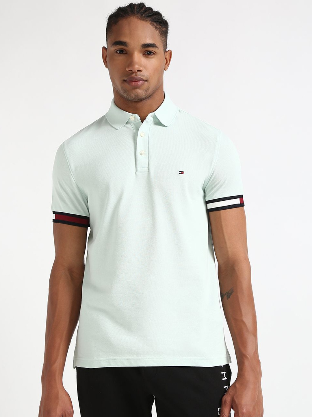 

Tommy Hilfiger Men Solid Polo Collar Cotton T-shirt, White