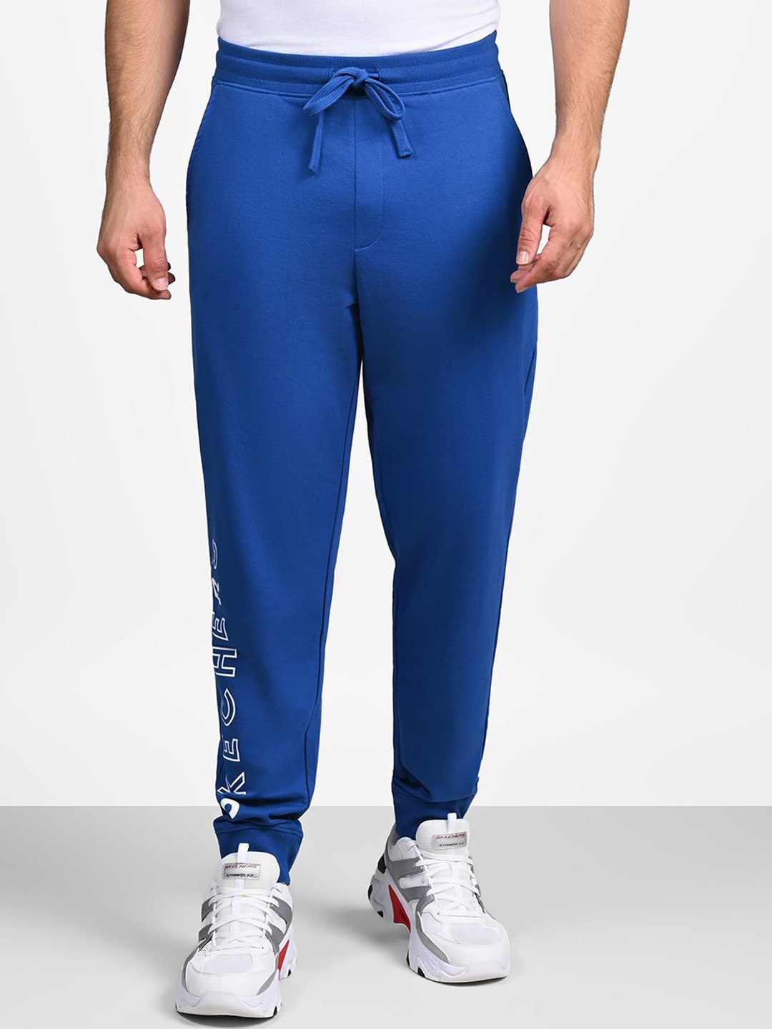 

Skechers Men Printed Cotton Mid-Rise Joggers, Blue