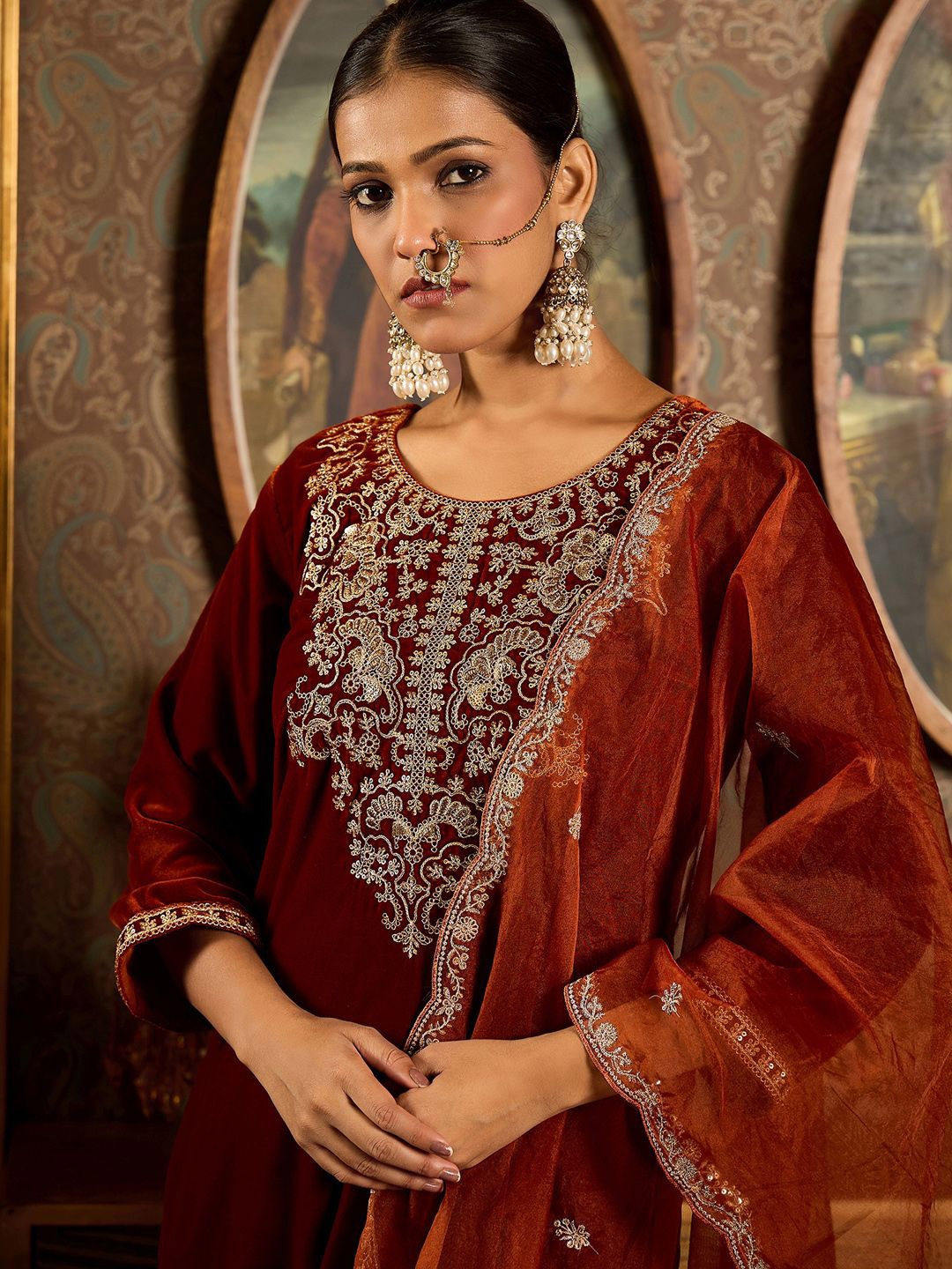 

Indo Era Ethnic Motifs Embroidered Thread Work Velvet Kurta with Trouser & Dupatta, Rust