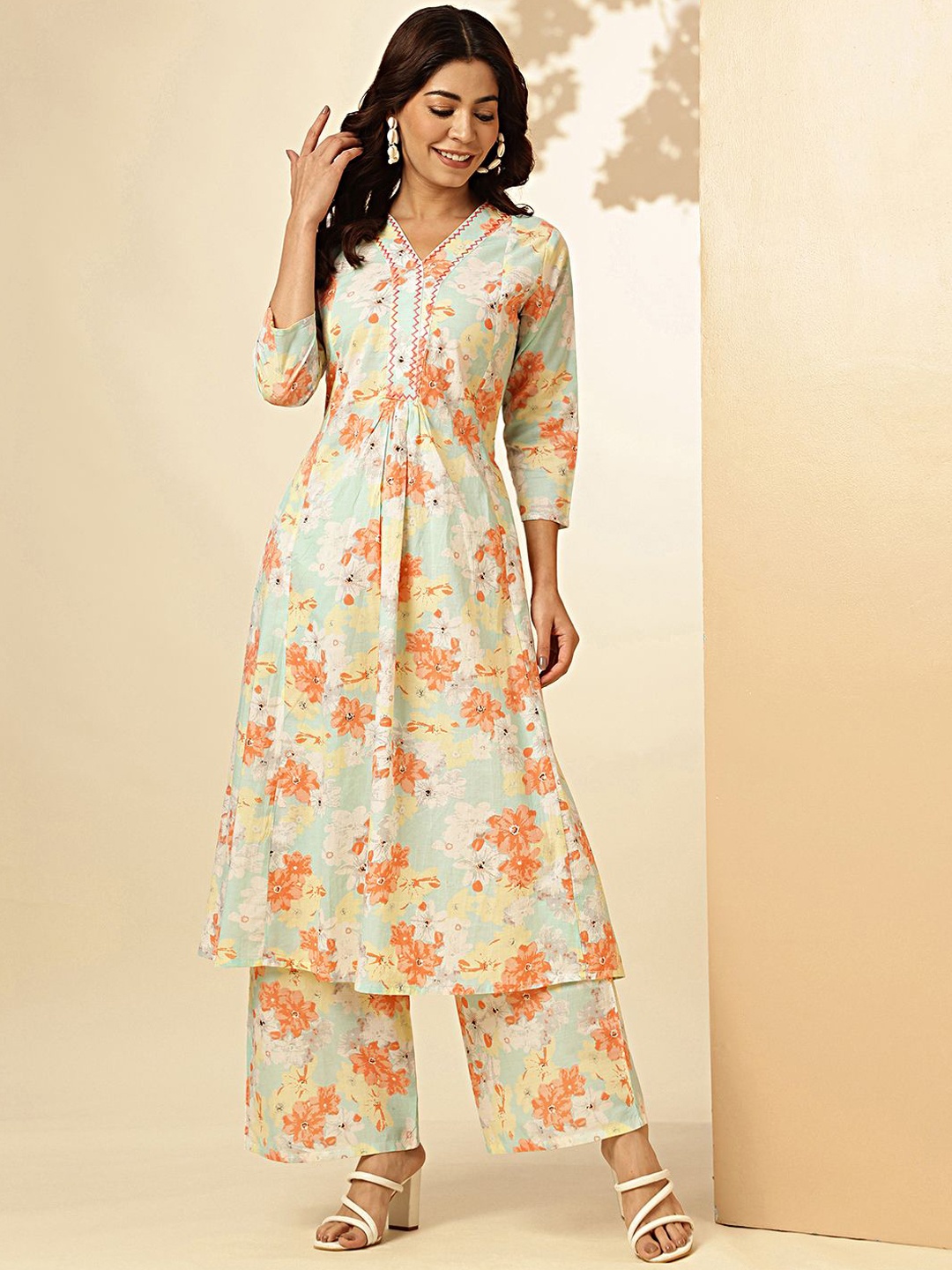 

Vbuyz Orange Floral Printed Three-Quarter Sleeves Pure Cotton A-Line Kurta & Palazzo