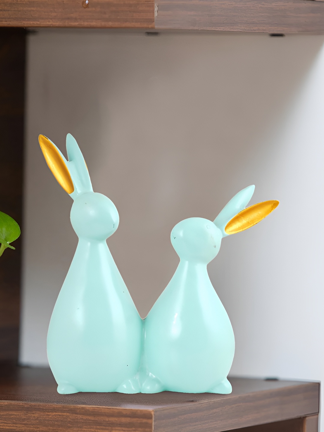 

Zart Green & Gold-Toned Cute Rabbit Pair Showpiece