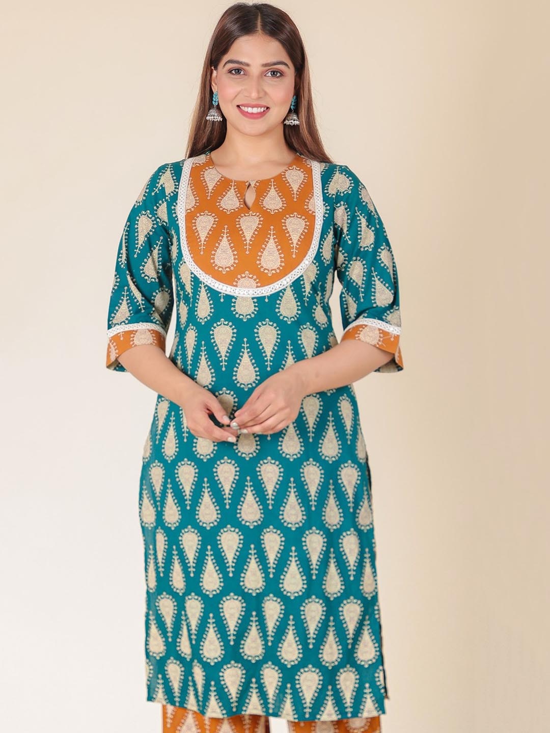 

Aramya Floral Printed Keyhole Neck Three-Quarter Sleeves Regular Pure Cotton Kurta, Turquoise blue