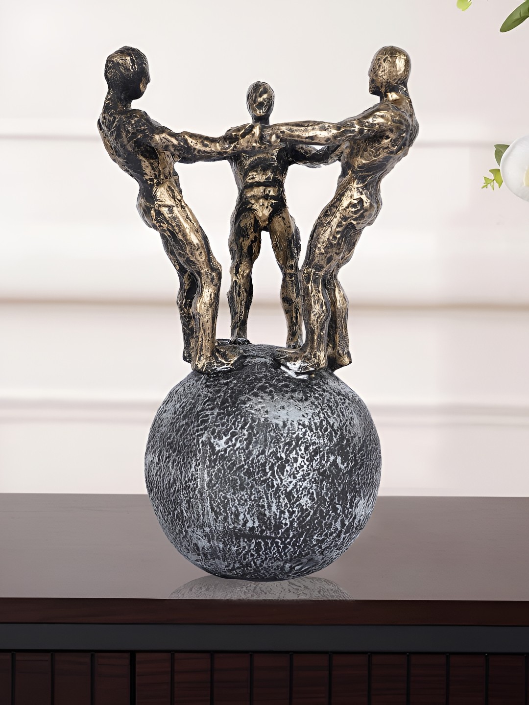 

Zart Gold-Toned Figurine Showpiece