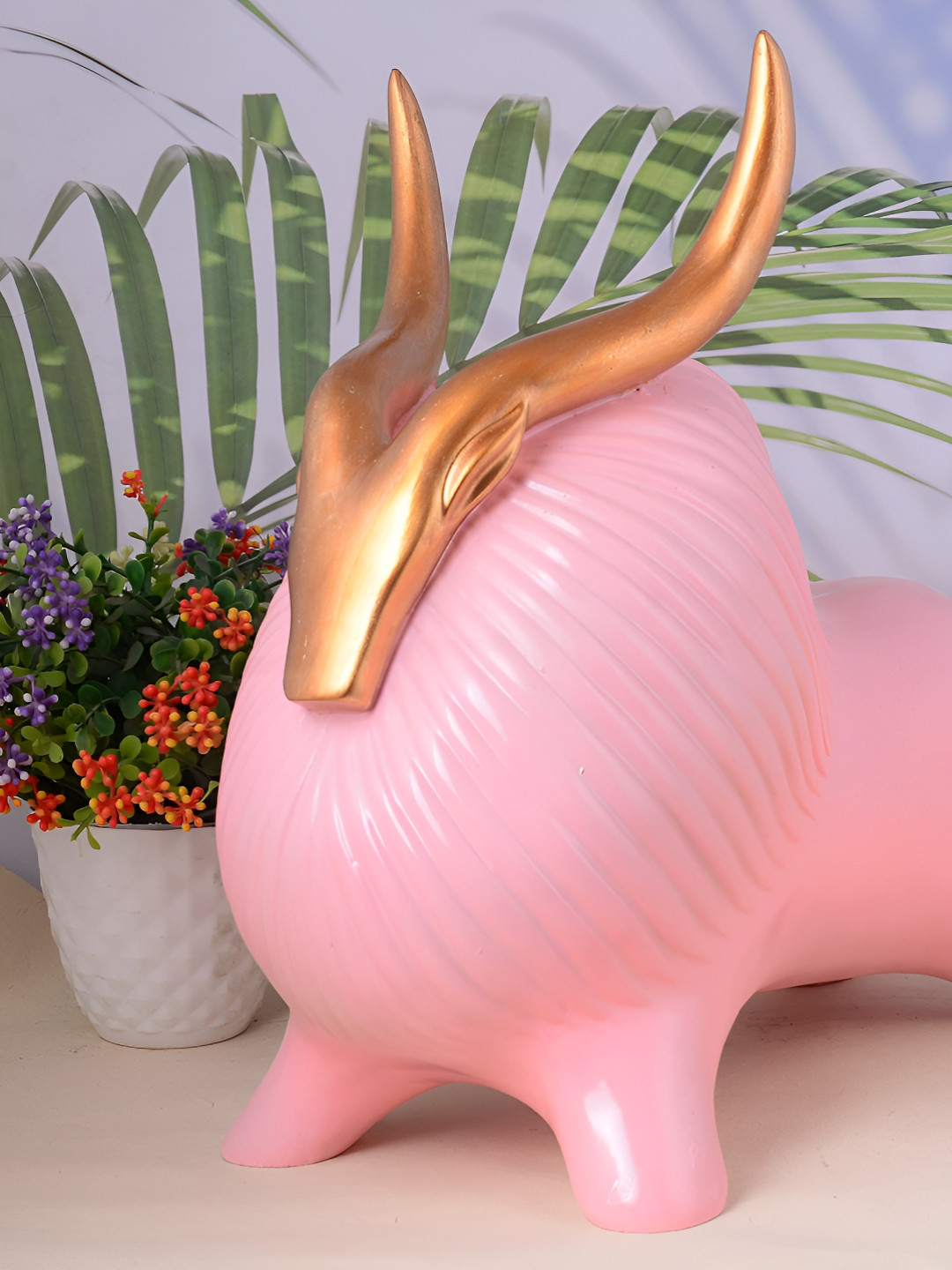 

Zart Pink & Gold-Toned Yak Showpiece