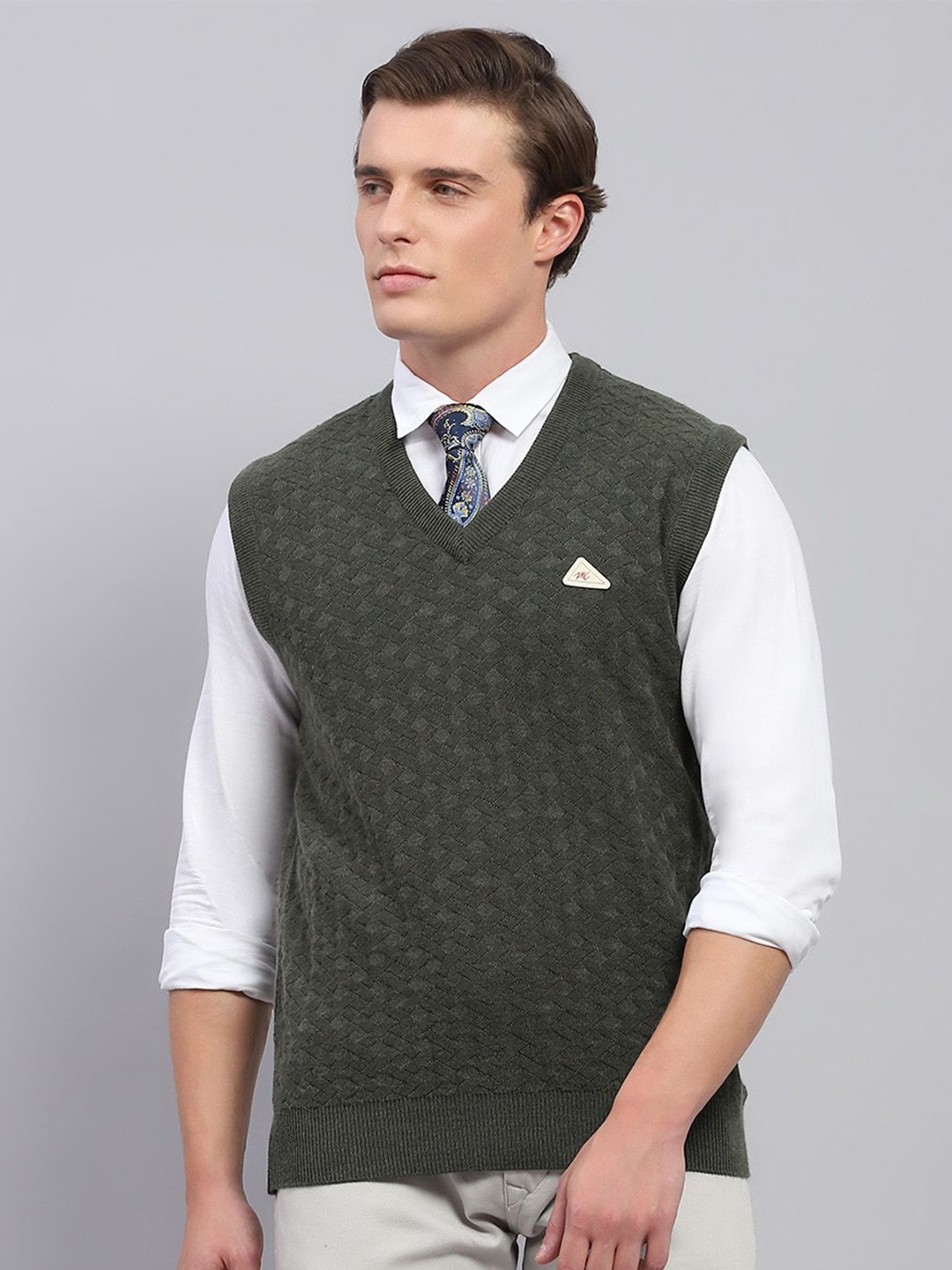 

Monte Carlo Men Woollen Self Design V Neck Sleeveless Pullover Sweater, Green