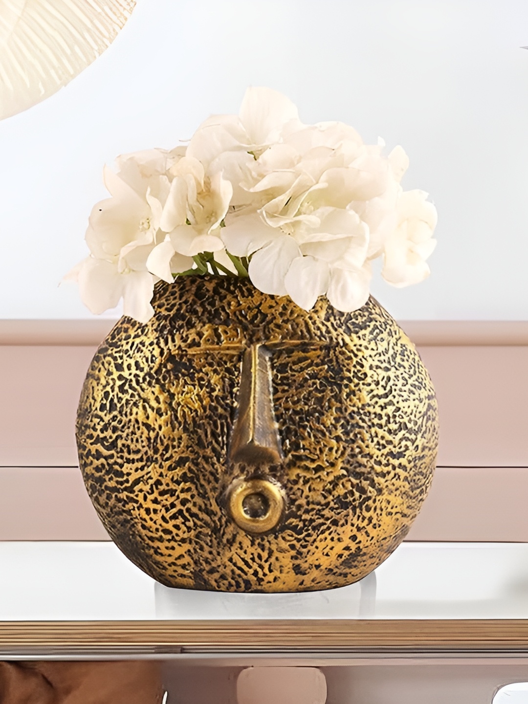 

Zart Gold Toned & Black Face Shaped Showpiece