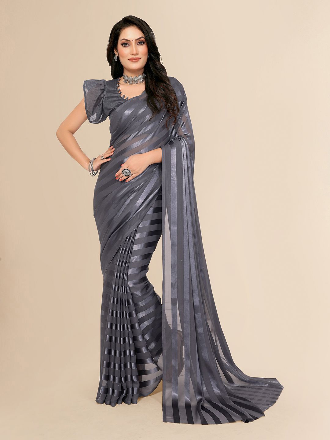 

Moda Rapido Women Striped Satin Saree, Grey