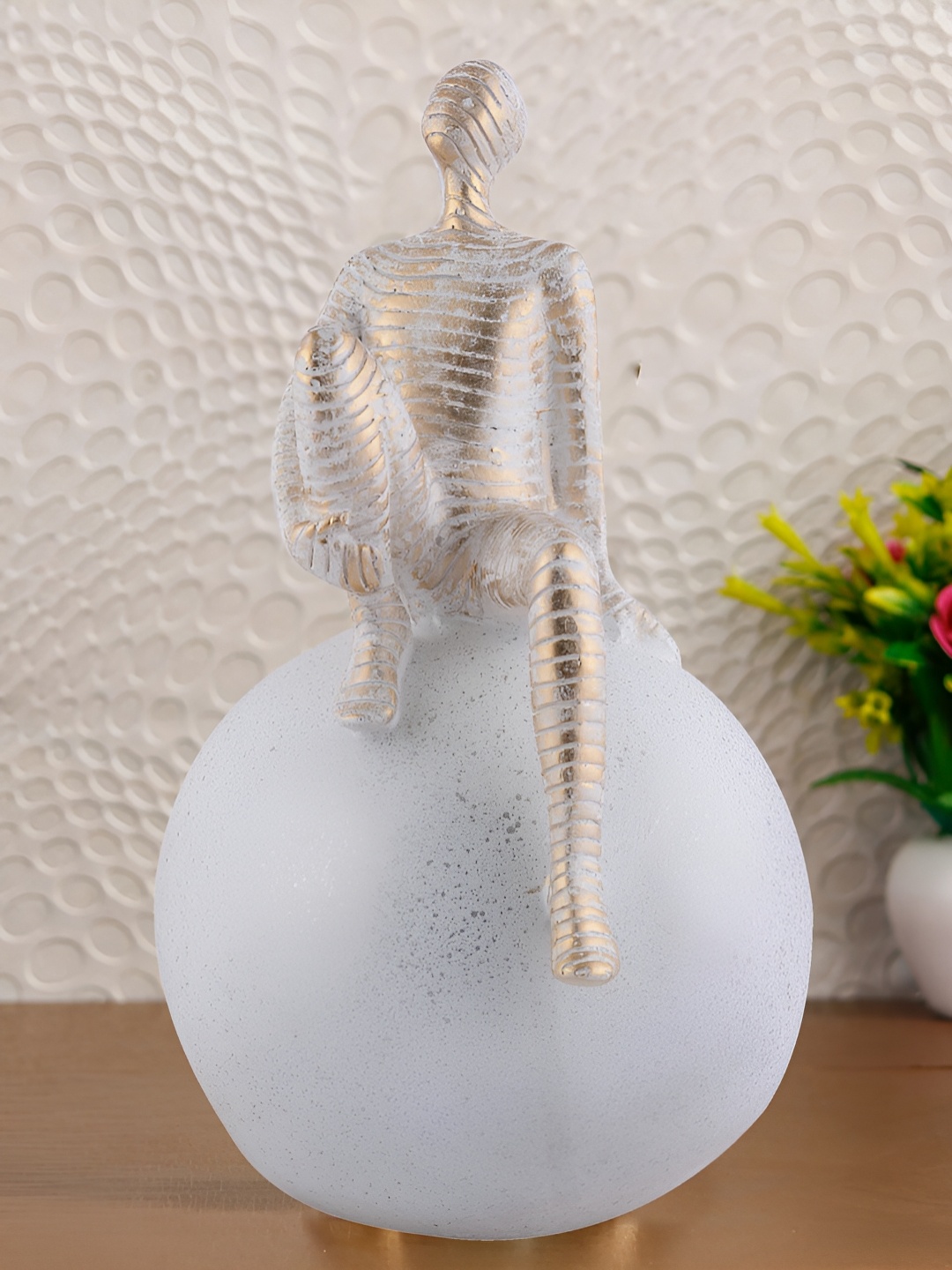 

Zart White Atlas Men Sitting on Ball Showpiece