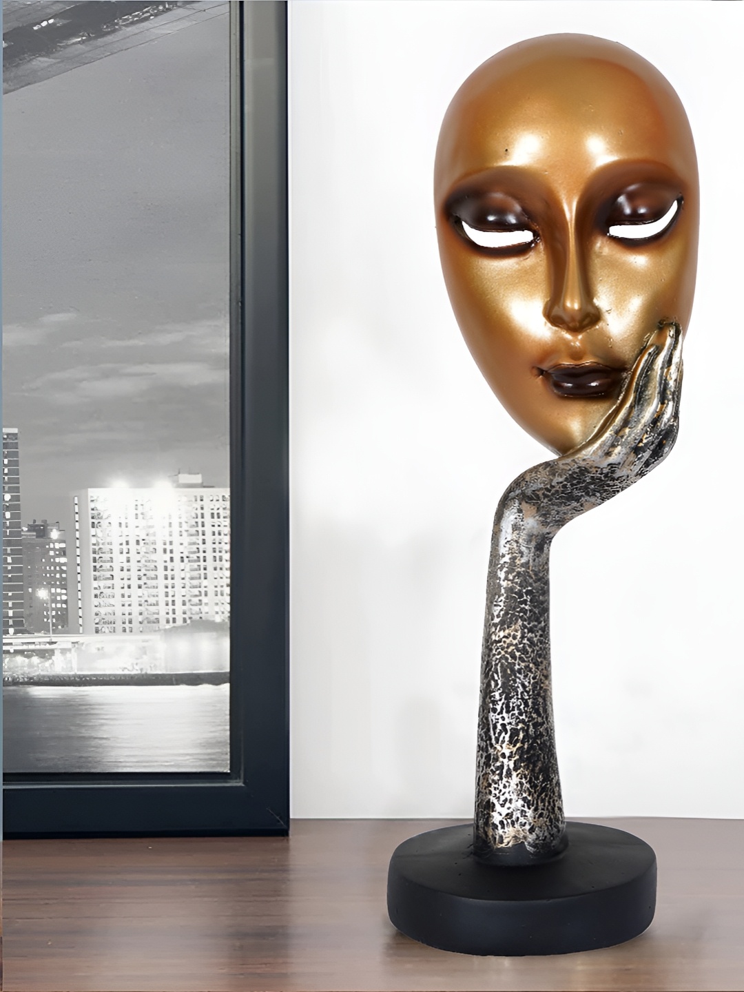 

Zart Gold-Toned Idol Showpiece